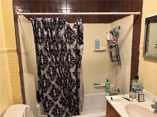 bathroom with vanity and shower / tub combo with curtain