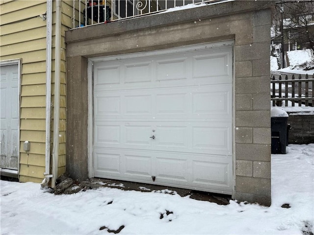 view of snow covered garage