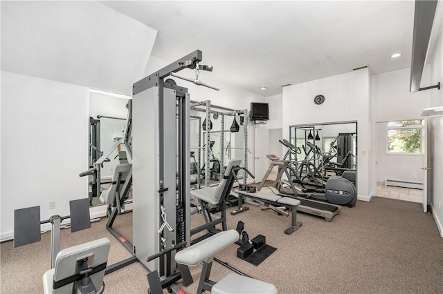 exercise room featuring a baseboard heating unit