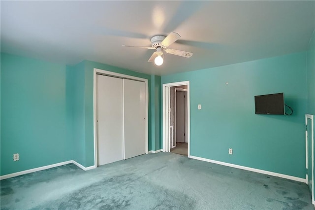 unfurnished bedroom with a closet, ceiling fan, and carpet