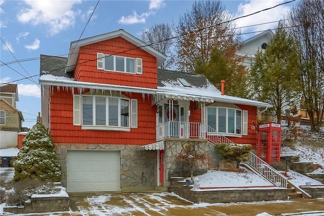 view of front of property with a garage