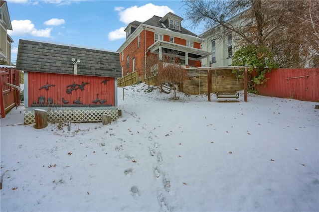 view of yard covered in snow