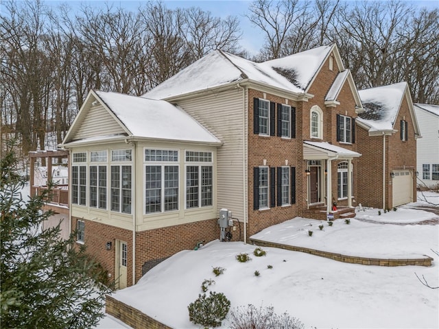 view of front of property featuring a garage