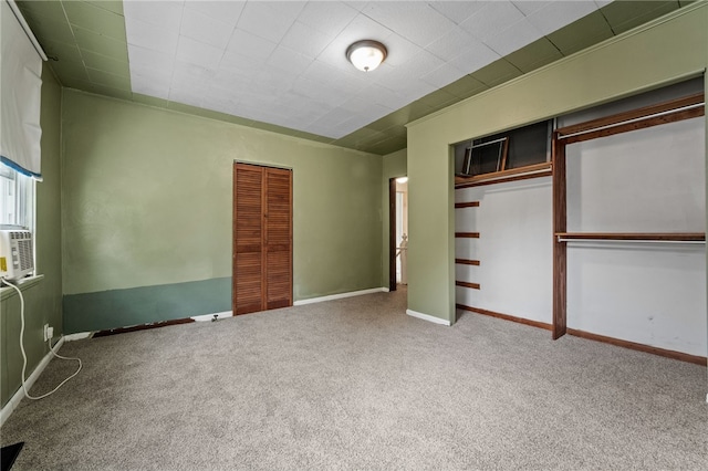 unfurnished bedroom with carpet floors