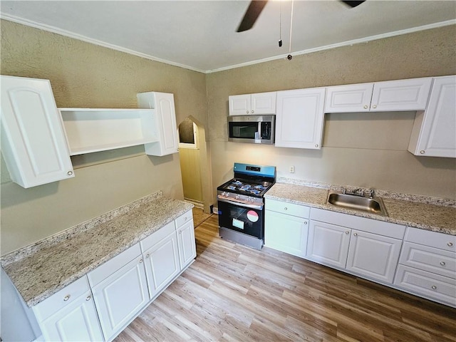 kitchen featuring white cabinets and stainless steel appliances