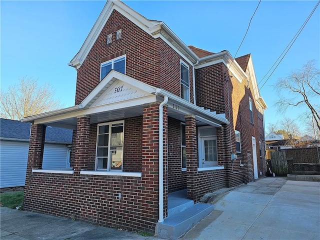 view of property exterior with a porch