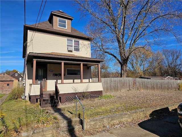 view of front of property featuring covered porch