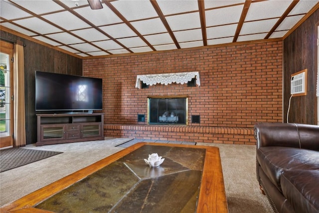 living room featuring wood walls, brick wall, carpet floors, and a wall unit AC