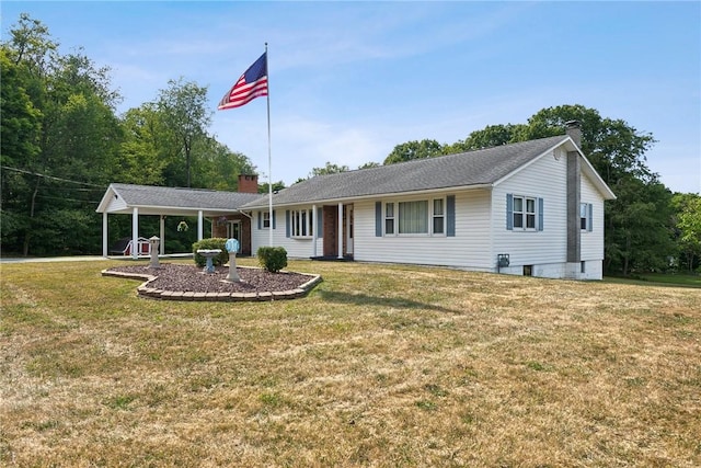 single story home featuring a front lawn