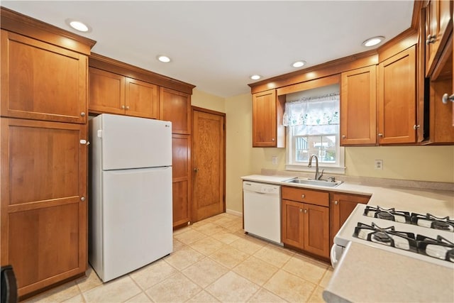 kitchen with white appliances and sink