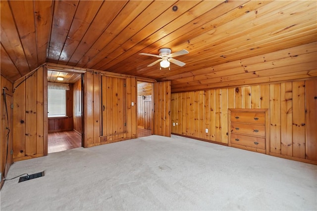 bonus room featuring carpet, ceiling fan, wood ceiling, and vaulted ceiling