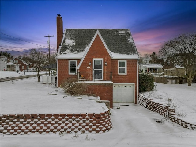 view of front of property with a garage