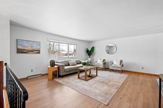 living room featuring light hardwood / wood-style flooring and a baseboard radiator