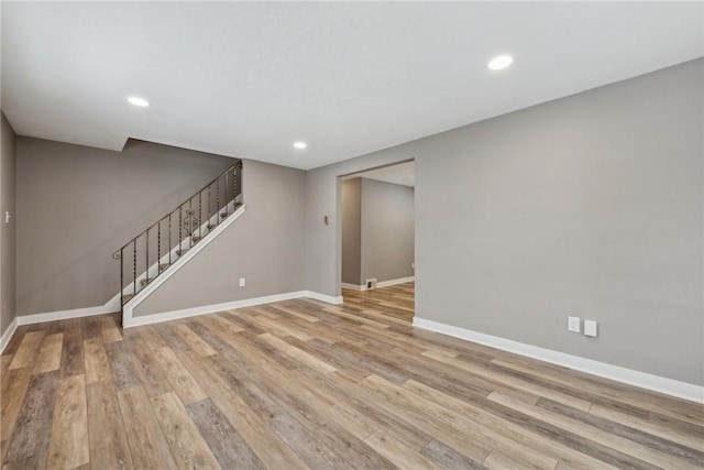 unfurnished room with light hardwood / wood-style flooring