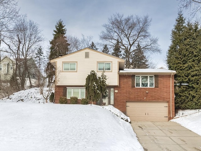 split level home featuring a garage