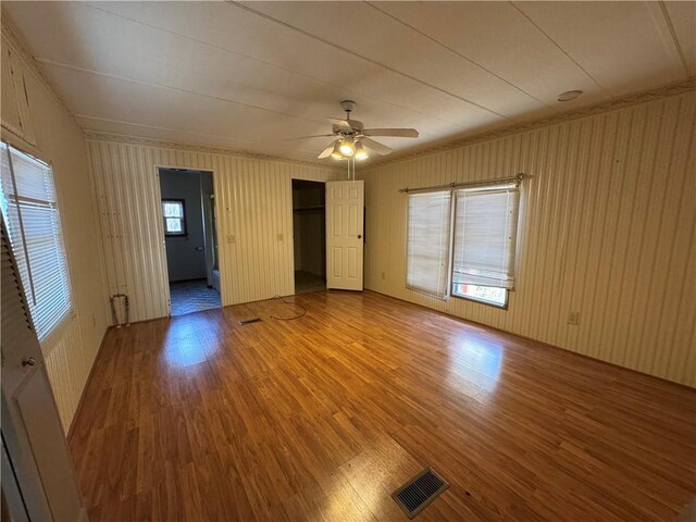 spare room featuring ceiling fan and wood-type flooring