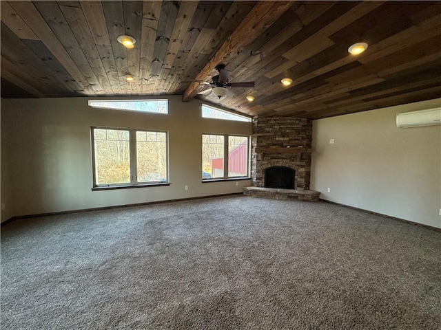 unfurnished living room with carpet flooring, ceiling fan, a stone fireplace, lofted ceiling with beams, and an AC wall unit