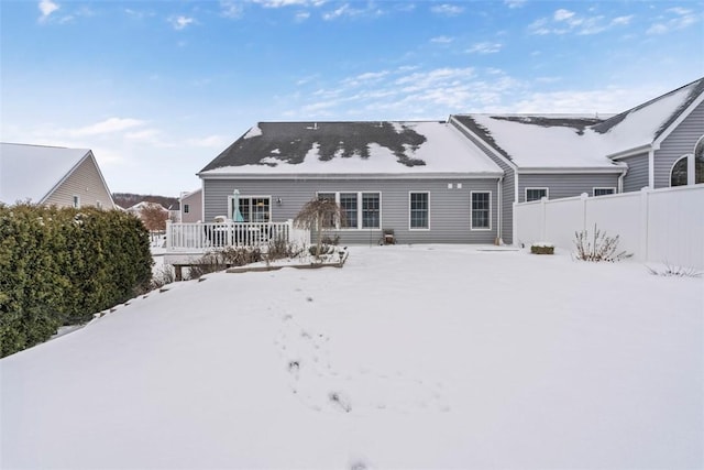 view of snow covered property