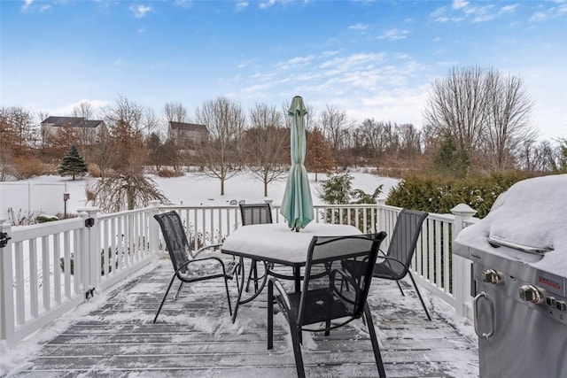 view of snow covered deck