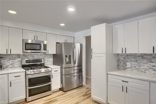 kitchen featuring white cabinets and stainless steel appliances