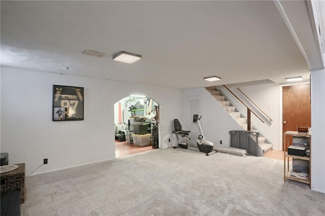 workout room featuring carpet