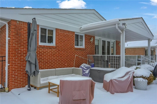 view of snow covered patio