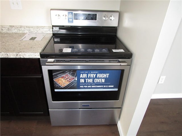 room details featuring stainless steel range with electric stovetop