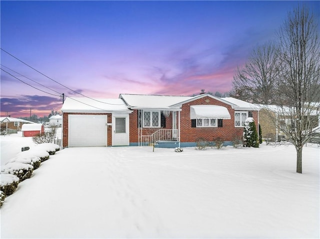 view of front of home with a garage