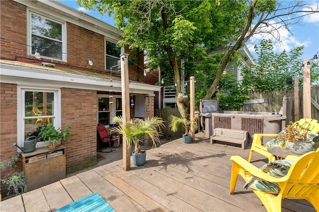 view of patio / terrace featuring a wooden deck