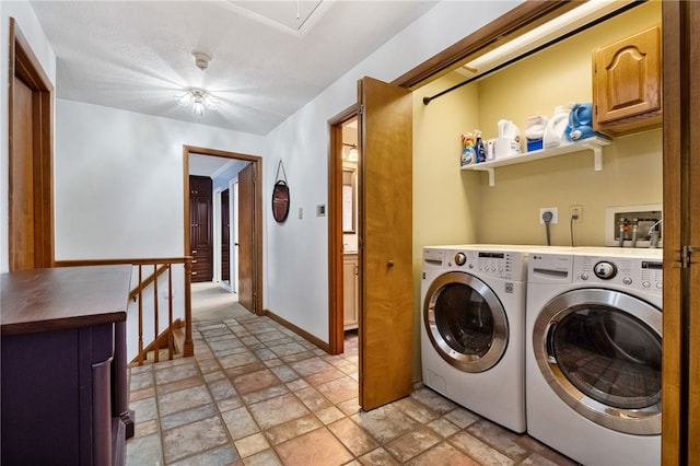 laundry room with washer and dryer