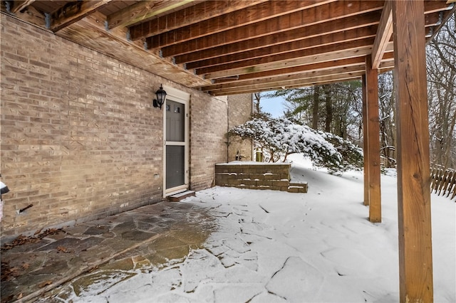 view of snow covered patio