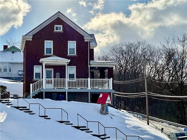 view of snow covered property