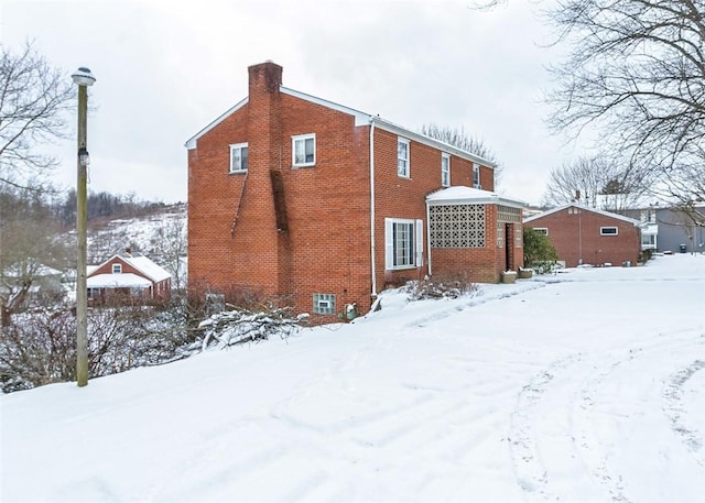 view of snow covered property