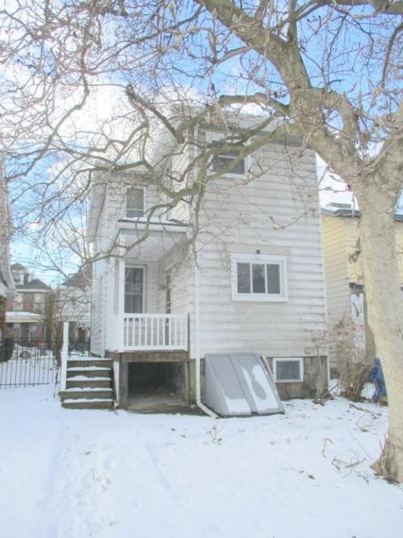 view of snow covered house