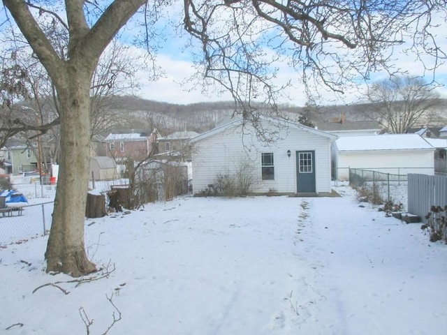 view of snow covered property