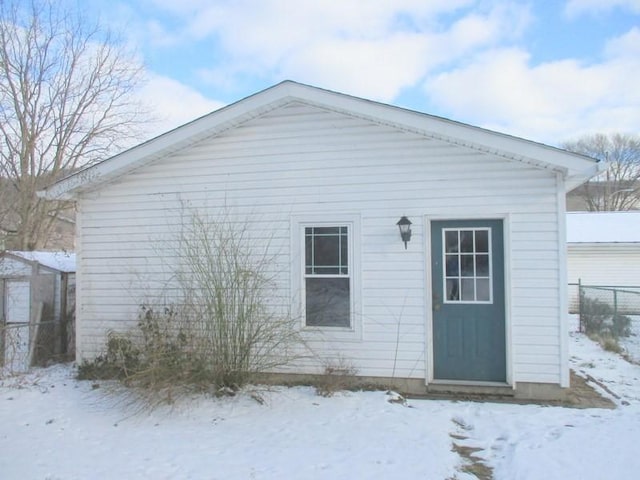 exterior space featuring a storage unit