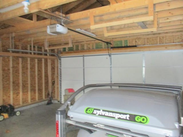 garage featuring a garage door opener