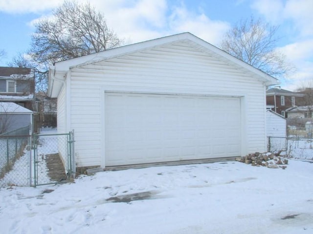 view of snow covered garage