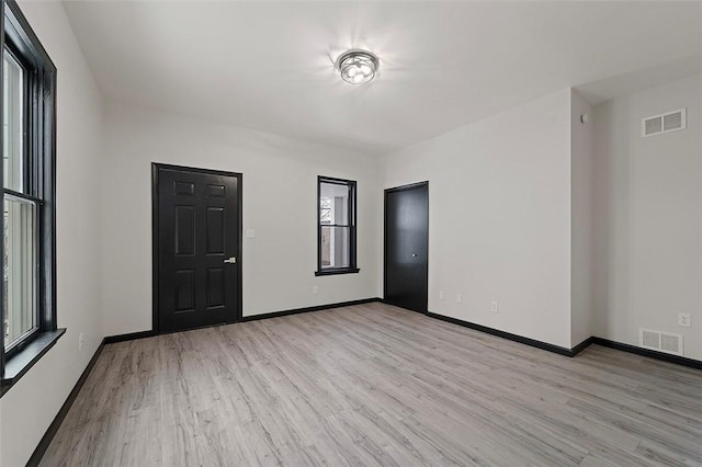 empty room featuring light hardwood / wood-style flooring