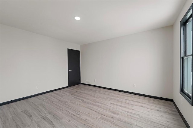 empty room featuring light hardwood / wood-style flooring