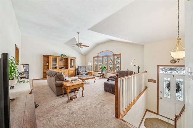 living room with light carpet, ceiling fan, and vaulted ceiling