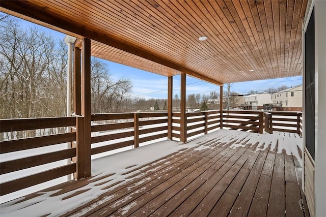 view of snow covered deck