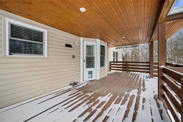 view of snow covered deck