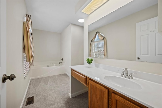 bathroom featuring a bathtub and vanity