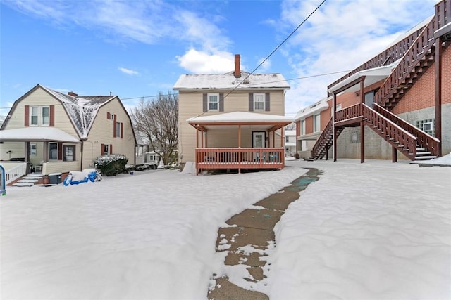 view of snow covered property