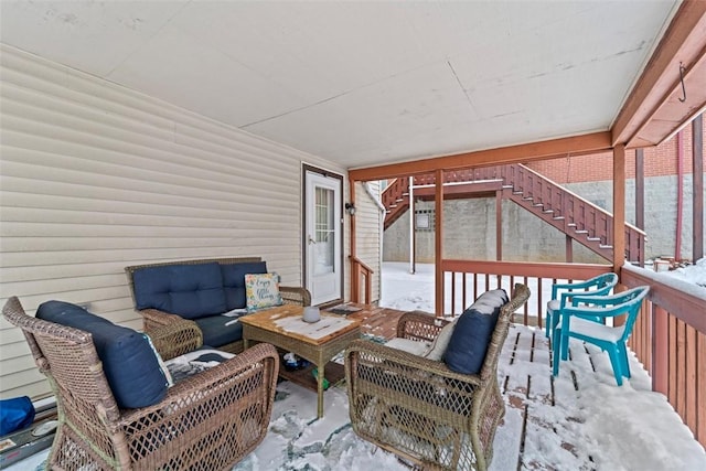 wooden deck featuring an outdoor living space