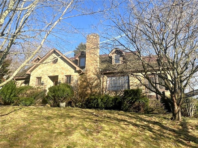 exterior space with a front lawn