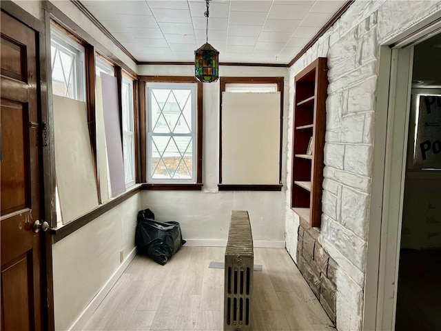 unfurnished sunroom featuring a healthy amount of sunlight