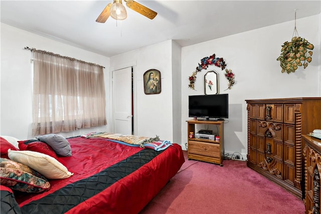 bedroom with ceiling fan and carpet flooring