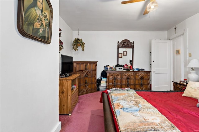 bedroom featuring ceiling fan and carpet flooring